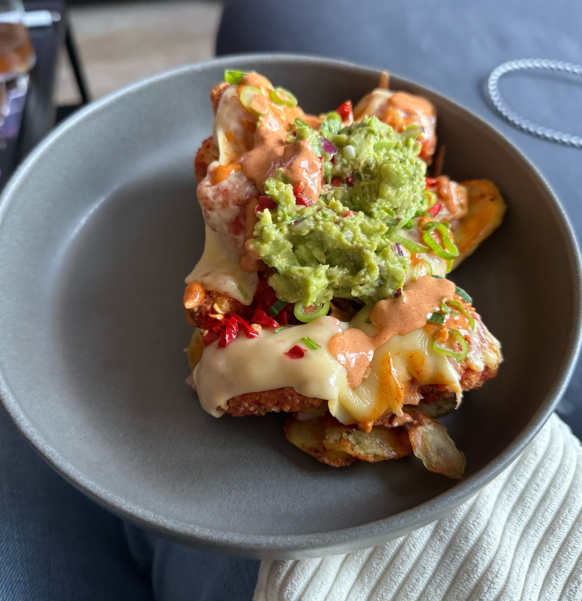 Loaded chicken fries with guacamole and smoky sauce